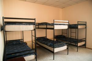 Ліжко або ліжка в номері Si-Yo hostel