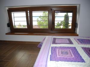 Postel nebo postele na pokoji v ubytování Apartments JASMINKA