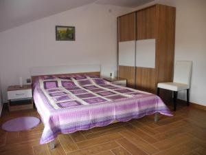 Postel nebo postele na pokoji v ubytování Apartments JASMINKA