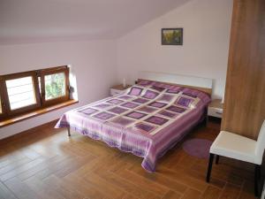 Postel nebo postele na pokoji v ubytování Apartments JASMINKA