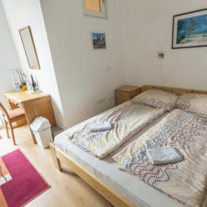 Letto o letti in una camera di Balaton Vendégház Fonyód