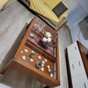 a table with seashells on it in a room at BEAUTIFUL APARTMENT IN VERIA in Veria