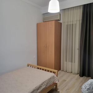 A bed or beds in a room at BEAUTIFUL APARTMENT IN VERIA