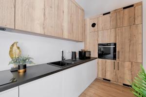 Kuchnia lub aneks kuchenny w obiekcie Apartament Morskie Oko Odkryj Zakopane