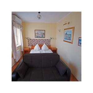 Voodi või voodid majutusasutuse Hotel Balaton Fonyód toas