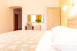 Postel nebo postele na pokoji v ubytování Hotel Klimt