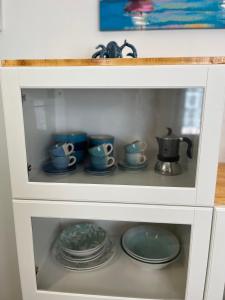 A kitchen or kitchenette at La Casa di Orimari