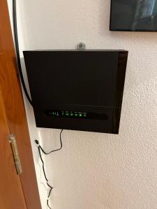 A television and/or entertainment centre at La Casa di Orimari