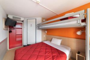 Postel nebo postele na pokoji v ubytování Hotel Fleury Merogis - Ex Premiere Classe Fleury Merogis