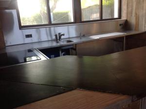 a kitchen with a counter top and a sink at Vakantie & wellness Erezee in Érezée +6 photos