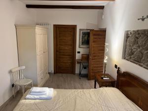 Postel nebo postele na pokoji v ubytování Albergo Diffuso Locanda Specchio Di Diana