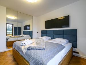 Posteľ alebo postele v izbe v ubytovaní VisitZakopane- Sekwoja Apartment