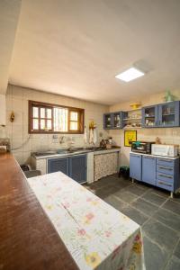 Kuchyň nebo kuchyňský kout v ubytování Hostel Papagaio