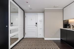 Kuchnia lub aneks kuchenny w obiekcie Baltic Park Fort Promenada Apartment Świnoujście by Noclegi Renters