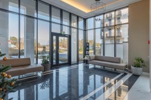 Posedenie v ubytovaní Baltic Park Fort Promenada Apartment Świnoujście by Noclegi Renters