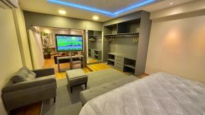 TV a/nebo společenská místnost v ubytování Hd Park Hotel