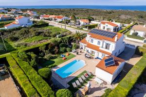 an aerial view of a house with a swimming pool at Casa Da Bauhinia in Aljezur