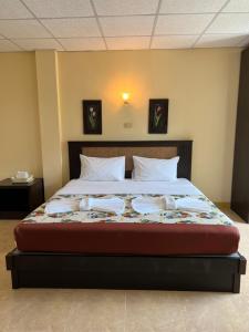 Postel nebo postele na pokoji v ubytování RT KhaoLak Hotel