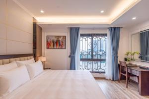 Postel nebo postele na pokoji v ubytování Reyna Luxury Hotel & Spa + 37 fotografií