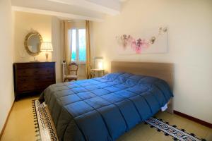 Katil atau katil-katil dalam bilik di Lara nice apartment 100m from Piazza del Campo