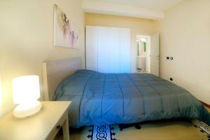 Katil atau katil-katil dalam bilik di Lara nice apartment 100m from Piazza del Campo