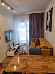Telewizja i/lub zestaw kina domowego w obiekcie Apartament Wyspiański