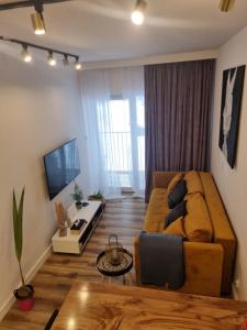 Telewizja i/lub zestaw kina domowego w obiekcie Apartament Wyspiański