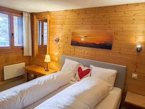Postel nebo postele na pokoji v ubytování Apartment Sernisa Rez by Interhome