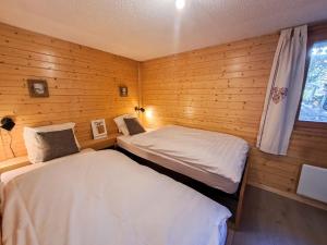 Voodi või voodid majutusasutuse Apartment Sernisa Rez by Interhome toas