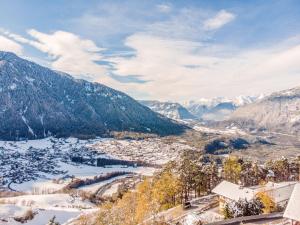 a view of a valley in the mountains with snow at Holiday Home Plattner-2 by Interhome in Oetz