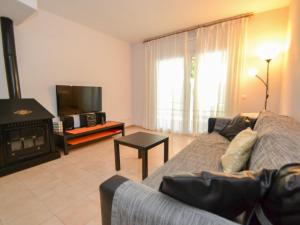 A television and/or entertainment centre at Holiday Home Raquel by Interhome