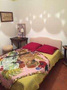 Posteľ alebo postele v izbe v ubytovaní Lou Jas, maison de charme, à 1 km de la mer