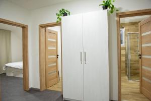 Posteľ alebo postele v izbe v ubytovaní Chalupy Slunná