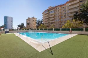 Swimmingpoolen hos eller tæt på Luxury apartment 100 mtrs Beach