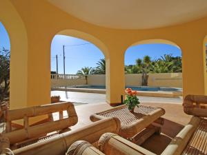 A seating area at Holiday Home Cucarres by Interhome