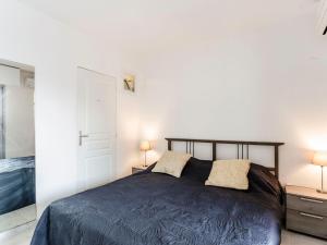 Krevet ili kreveti u jedinici u okviru objekta Apartment Port de La Gavine-28 by Interhome