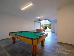 a pool table in the middle of a room at Villa Mariana by Interhome in Galé