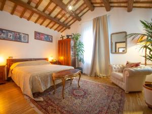 Ένα ή περισσότερα κρεβάτια σε δωμάτιο στο Holiday Home Casale Vincenzo by Interhome