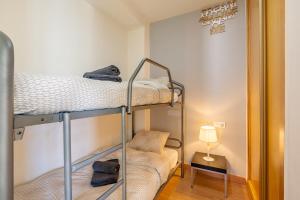 Ένα ή περισσότερα κρεβάτια σε δωμάτιο στο Apartamento Candela