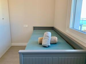 A bed or beds in a room at Four bedroom penthouse in Torrox