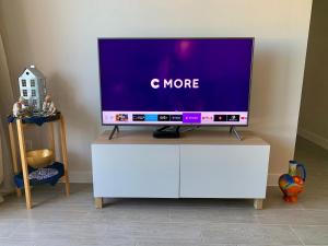 A television and/or entertainment centre at Four bedroom penthouse in Torrox