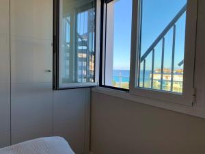 A bed or beds in a room at Four bedroom penthouse in Torrox