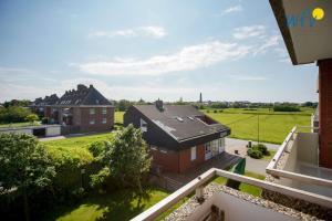 a view from the balcony of a house at Holiday Residenz - Ferienwohnung "Kuestenkind" in Borkum