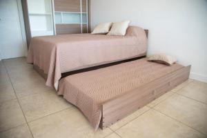 Postel nebo postele na pokoji v ubytování Un ambiente frente al mar