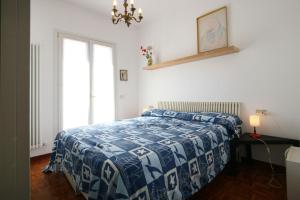 Llit o llits en una habitació de Villa Cremona