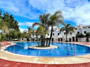 Bazén v ubytovaní NaviGolf La Cala de Mijas, Scandinavian style 3 bed Townhouse by Solrentspain. alebo v jeho blízkosti