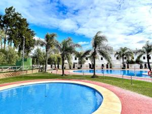 Bazén v ubytovaní NaviGolf La Cala de Mijas, Scandinavian style 3 bed Townhouse by Solrentspain. alebo v jeho blízkosti