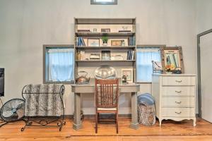 a desk with a chair and a dresser in a room at Pet-Friendly Loft Vacation Rental with Fire Pit! in Bemus Point