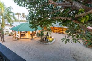 an image of a restaurant on the beach at Bamboo Paraiso Resort at Bolo Beach in Alaminos