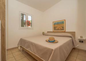 Postel nebo postele na pokoji v ubytování Villaggio Leucosia